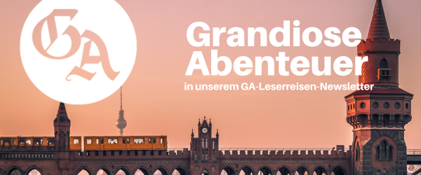 Stadt bei Sonnenuntergang Schriftzug &bdquo;Grandiose Abenteuer in unserem GA-Leserreisen-Newsletter